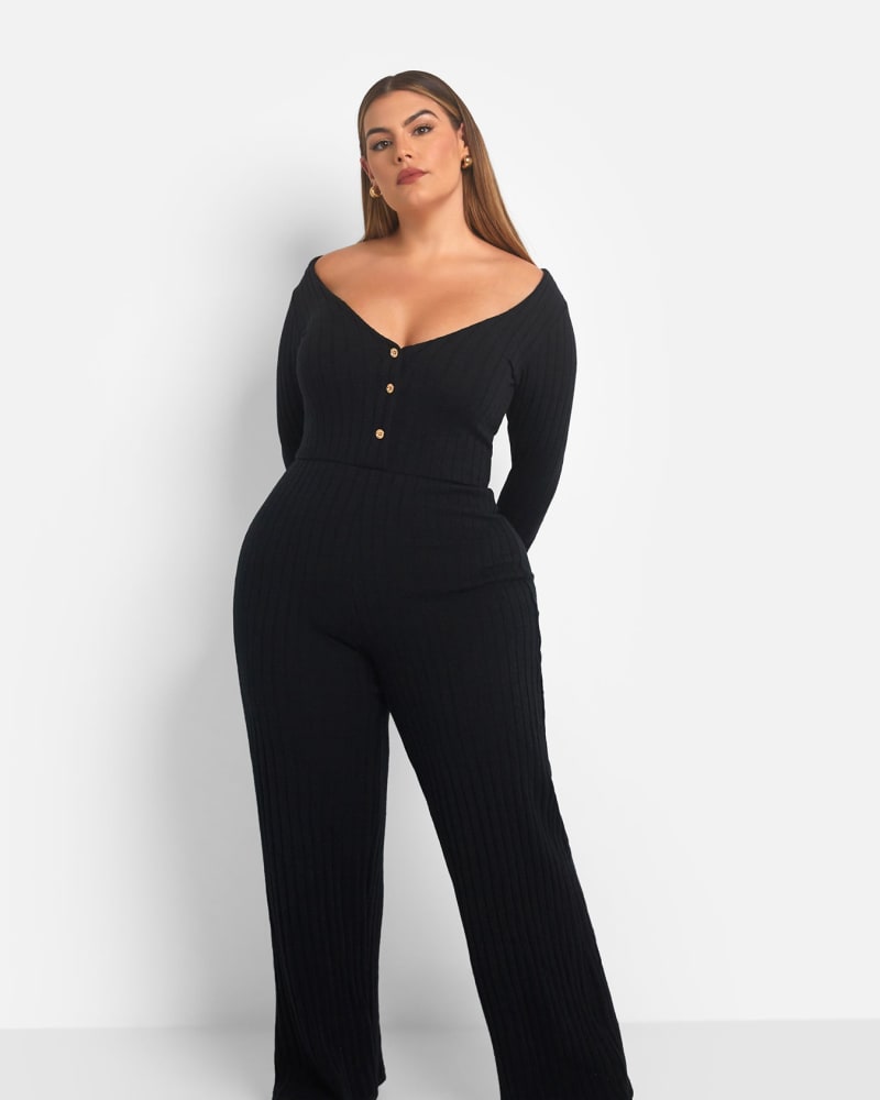 Front of a model wearing a size 4X Ruby Ribbed Button Front Wide Leg Jumpsuit in Black by Rebdolls. | dia_product_style_image_id:321338